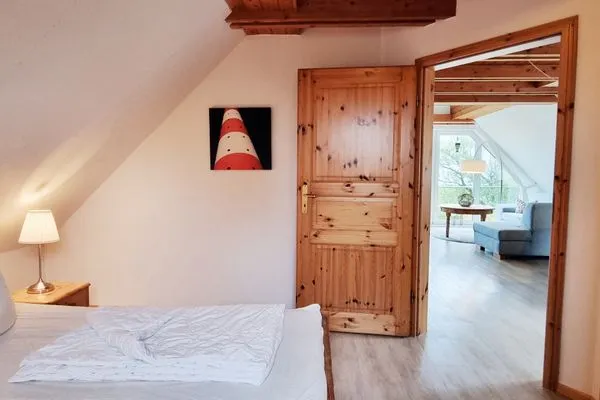 Schlafzimmer  Ferienwohnung "Achtern Diek 4" 1. Reihe an der Ostseeküste