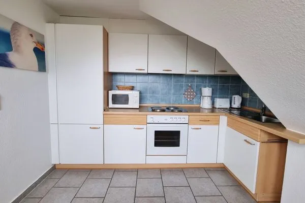 Küche / Küchenzeile  Ferienwohnung "Achtern Diek 4" 1. Reihe an der Ostseeküste