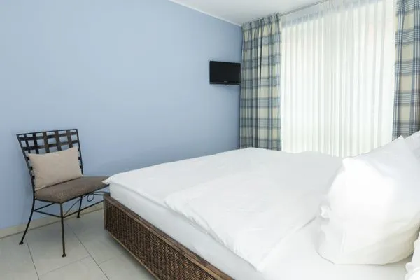 Schlafzimmer  Ferienwohnung Friesenrose