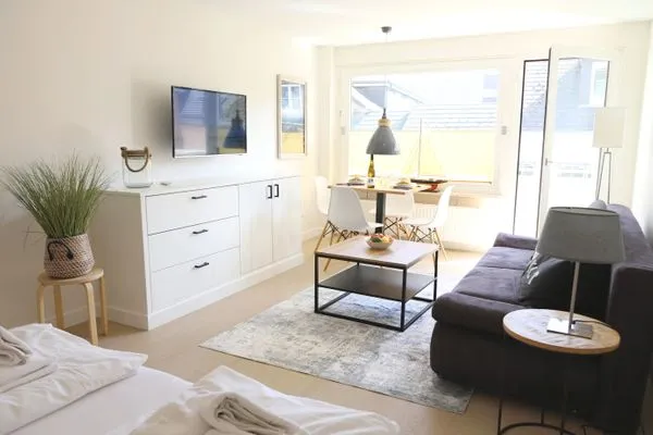 Wohnzimmer  Strandstr. 4, Whg. 8