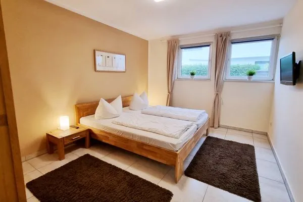 Schlafzimmer  Ferienwohnung "Baltic Sunrise" mit Garten an der Ostseeküste