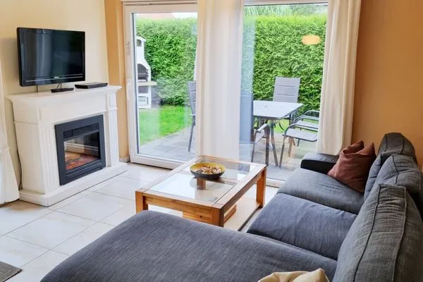 Wohnzimmer  Ferienwohnung "Baltic Sunrise" mit Garten an der Ostseeküste