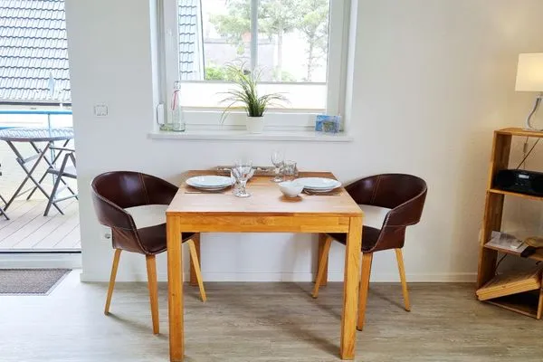 Wohnzimmer  Ferienwohnung "Baltic Sunset" in 1. Reihe zum Ostseestrand