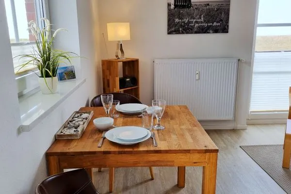 Wohnzimmer  Ferienwohnung "Baltic Sunset" in 1. Reihe zum Ostseestrand