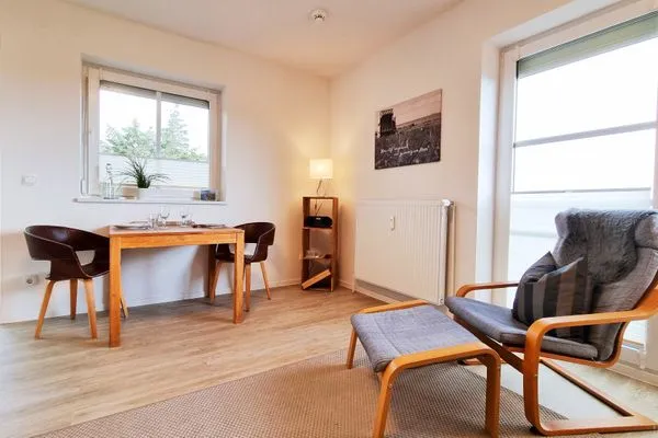 Wohnzimmer  Ferienwohnung "Baltic Sunset" in 1. Reihe zum Ostseestrand