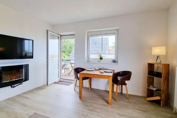 Wohnzimmer  Ferienwohnung "Baltic Sunset" in 1. Reihe zum Ostseestrand