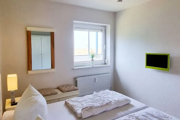 Schlafzimmer  Ferienwohnung "Baltic Sunset" in 1. Reihe zum Ostseestrand