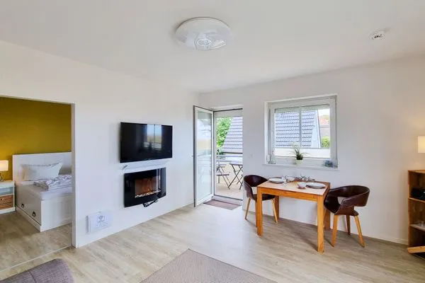 Wohnzimmer  Ferienwohnung "Baltic Sunset" in 1. Reihe zum Ostseestrand