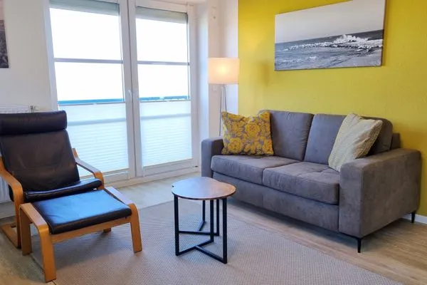Wohnzimmer  Ferienwohnung "Baltic Sunset" in 1. Reihe zum Ostseestrand