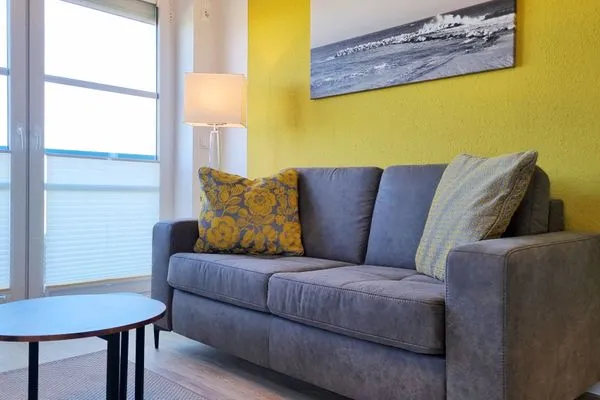 Wohnzimmer  Ferienwohnung "Baltic Sunset" in 1. Reihe zum Ostseestrand