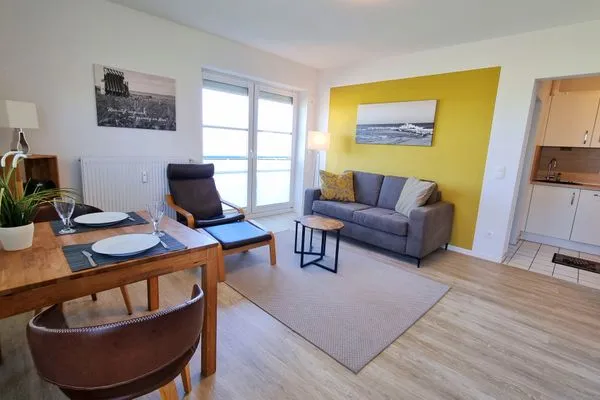 Wohnzimmer  Ferienwohnung "Baltic Sunset" in 1. Reihe zum Ostseestrand