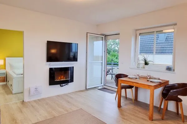 Wohnzimmer  Ferienwohnung "Baltic Sunset" in 1. Reihe zum Ostseestrand