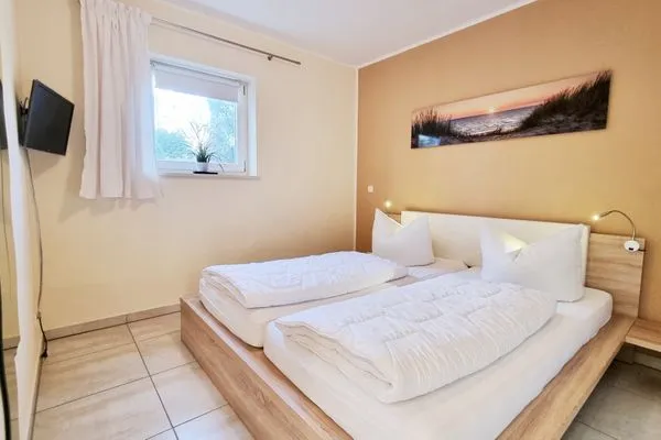 Schlafzimmer  Ferienwohnung "Baltic Sunshine" in Kalifornien an der Ostsee