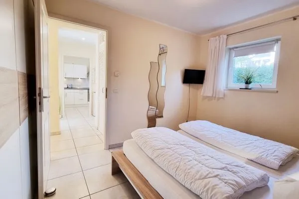 Schlafzimmer  Ferienwohnung "Baltic Sunshine" in Kalifornien an der Ostsee