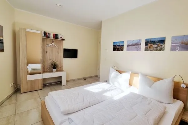 Schlafzimmer  Ferienwohnung "Baltic Sunshine" in Kalifornien an der Ostsee