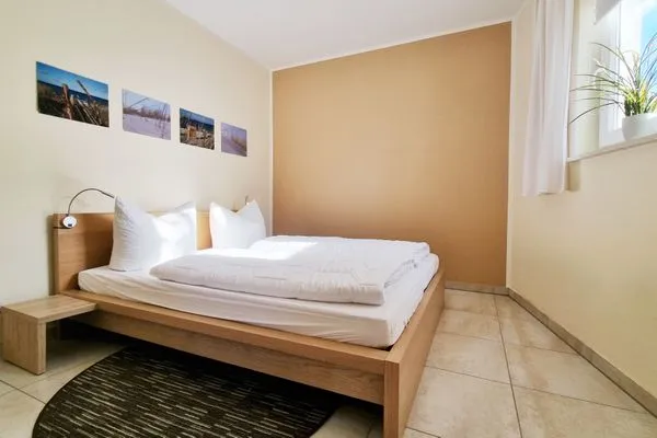 Schlafzimmer  Ferienwohnung "Baltic Sunshine" in Kalifornien an der Ostsee