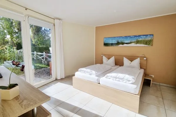 Schlafzimmer  Ferienwohnung "Baltic Sunshine" in Kalifornien an der Ostsee