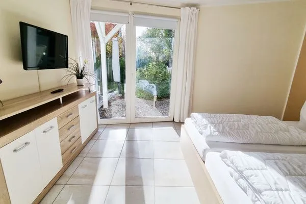 Schlafzimmer  Ferienwohnung "Baltic Sunshine" in Kalifornien an der Ostsee