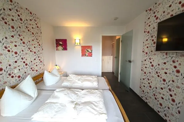 Schlafzimmer  Ferienwohnung "Deichwind" in Holm an der Ostsee