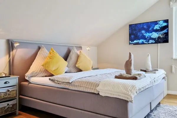 Schlafzimmer  Ferienhaus "Küstenhuus" in Kalifornien an der Ostsee