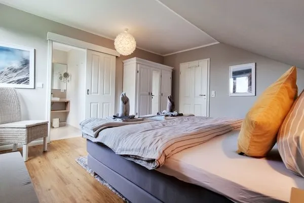 Schlafzimmer  Ferienhaus "Küstenhuus" in Kalifornien an der Ostsee