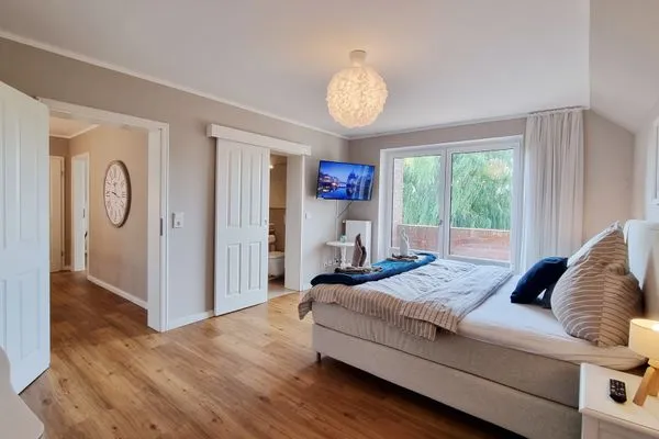 Schlafzimmer  Ferienhaus "Küstenhuus" in Kalifornien an der Ostsee