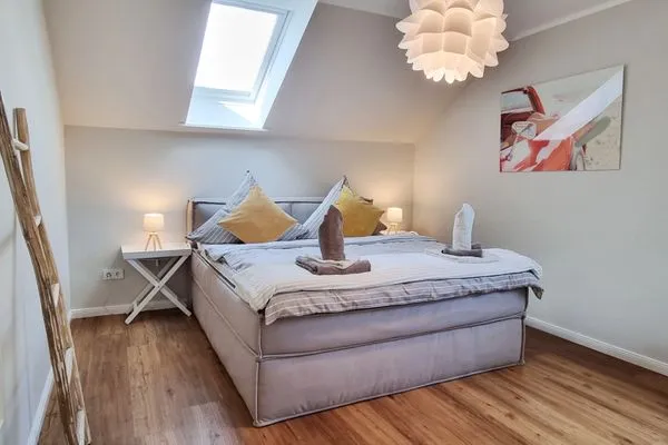 Schlafzimmer  Ferienhaus "Küstenhuus" in Kalifornien an der Ostsee