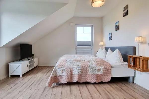 Schlafzimmer  Schwedenhaushälfte "Küstenliebe" in Sehlendorf an der Ostsee