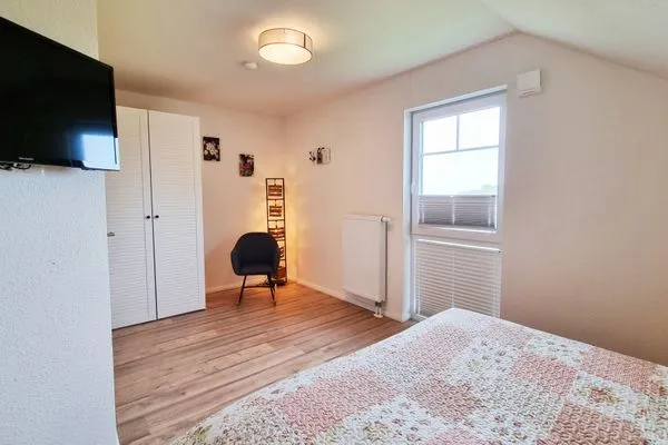 Schlafzimmer  Schwedenhaushälfte "Küstenliebe" in Sehlendorf an der Ostsee