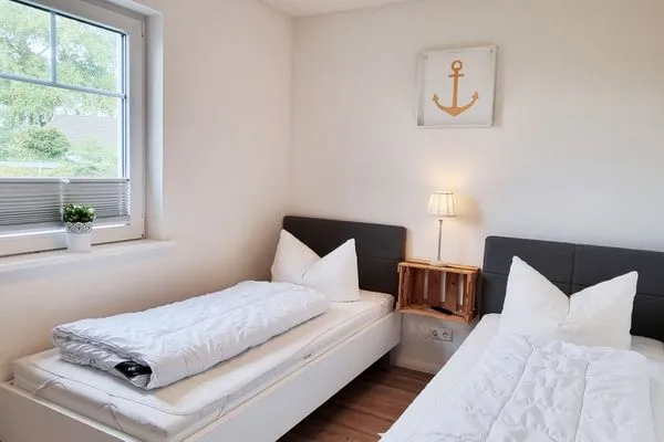 Schlafzimmer  Schwedenhaushälfte "Küstenliebe" in Sehlendorf an der Ostsee