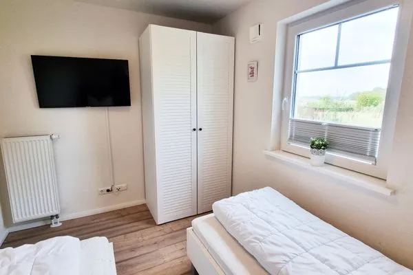 Schlafzimmer  Schwedenhaushälfte "Küstenliebe" in Sehlendorf an der Ostsee