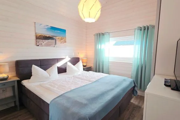 Schlafzimmer  Ferienhaus "Lönneberga" im Ferienpark Holm an der Ostsee