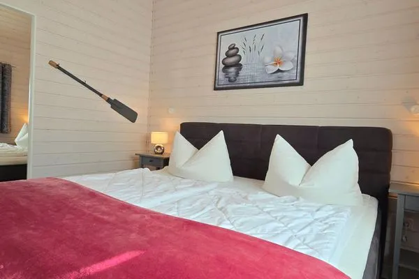 Schlafzimmer  Ferienhaus "Lönneberga" im Ferienpark Holm an der Ostsee