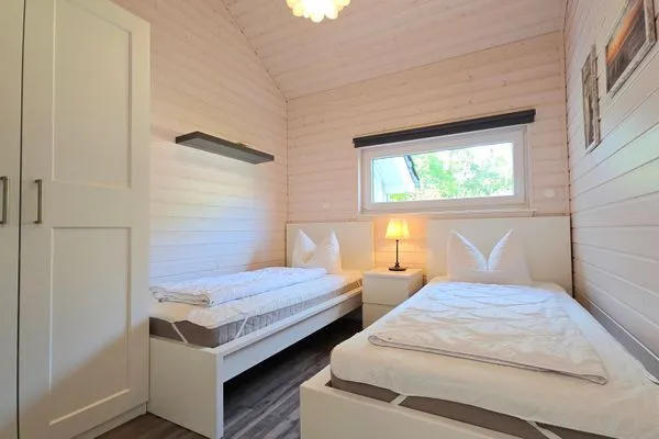 Schlafzimmer  Ferienhaus "Lönneberga" im Ferienpark Holm an der Ostsee