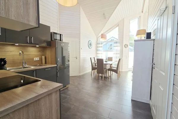 Wohnzimmer  Ferienhaus "Lönneberga" im Ferienpark Holm an der Ostsee