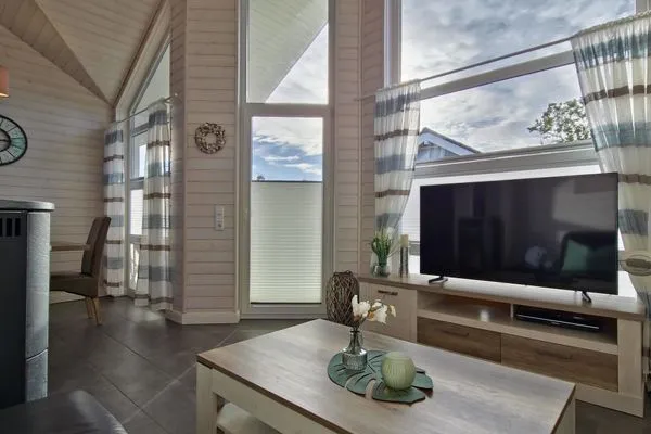 Wohnzimmer  Ferienhaus "Lönneberga" im Ferienpark Holm an der Ostsee