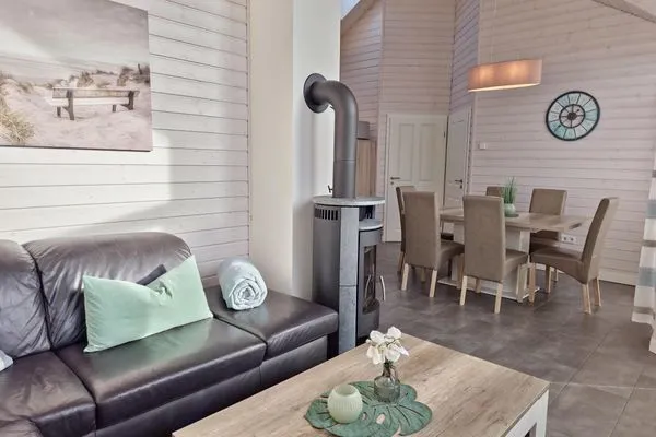 Wohnzimmer  Ferienhaus "Lönneberga" im Ferienpark Holm an der Ostsee