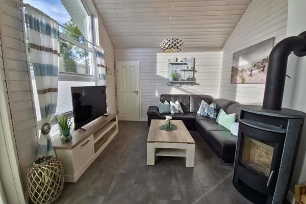 Wohnzimmer  Ferienhaus "Lönneberga" im Ferienpark Holm an der Ostsee
