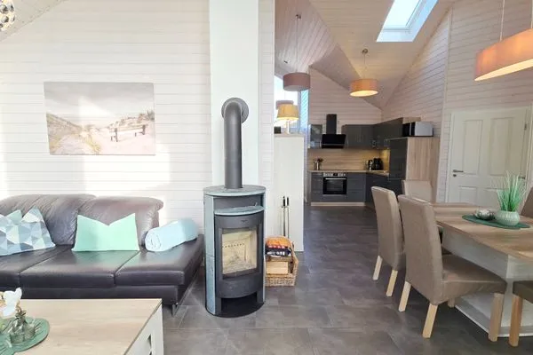 Wohnzimmer  Ferienhaus "Lönneberga" im Ferienpark Holm an der Ostsee