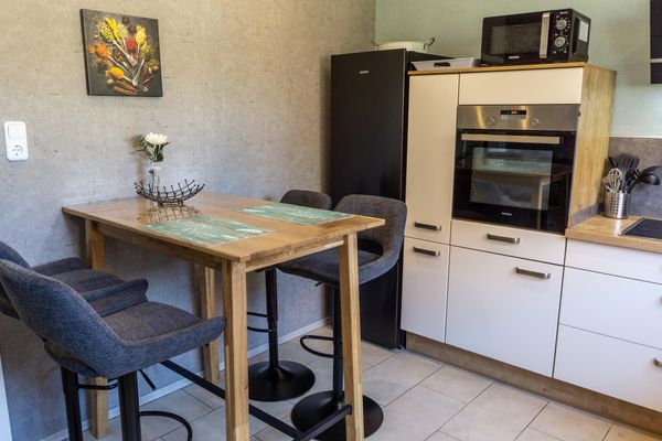  Ferienhaus Westerstraße Tönning - Küche mit Esstisch