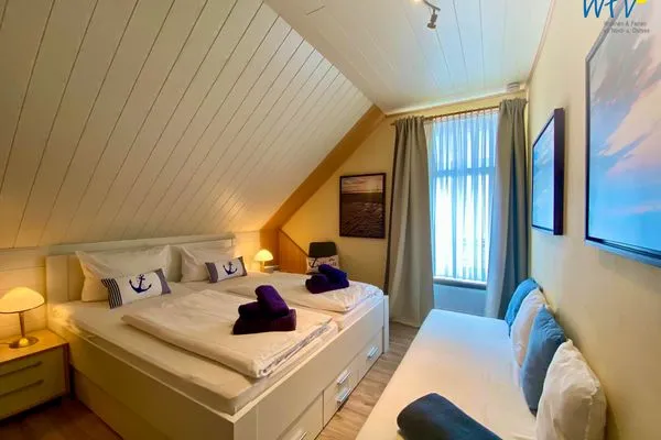 Schlafzimmer Haus Delphin Ferienwohnung 1