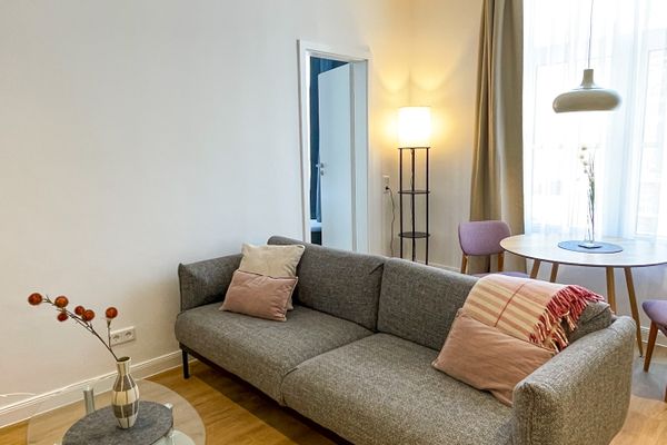  Haus Derk Juist - Wohnung 12 Borkum - Blick vom Eingangsbereich auf das Sofa
