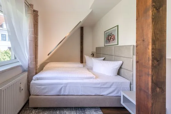 Ferienwohnung Seeperle Schlafzimmer mit Fenster  Seeperle