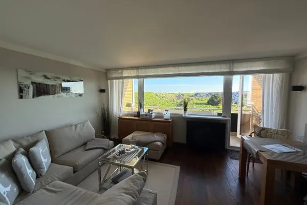 mit schönem Blick in die Natur und einem Gaskamin Ferienwohnung Brandenburgerstr. 11 - Dühne16 mit kleinem Meerblick