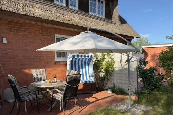 Terrasse Haus Pesel Ferienwohnung *Reetblick*