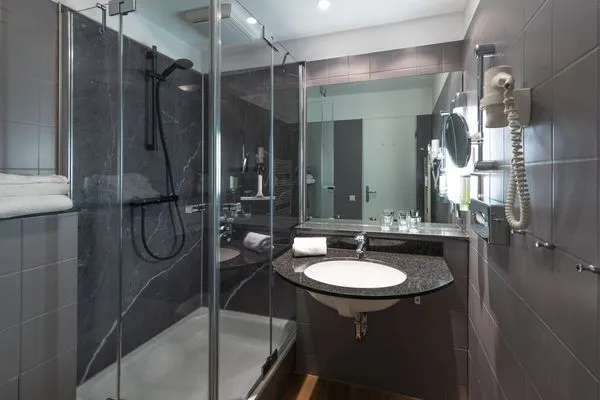 Ferienwohnung Herzmuschel Aparthotel Zingst - Blick ins Badezimmer  Herzmuschel