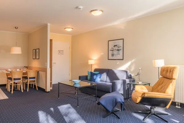 Ferienwohnung An de See offener Wohnberreich mit Esstisch  An de See