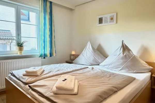 Ferienhaus Dani Ferienwohnung Rebgarten Nonnenhorn - Schlafzimmer