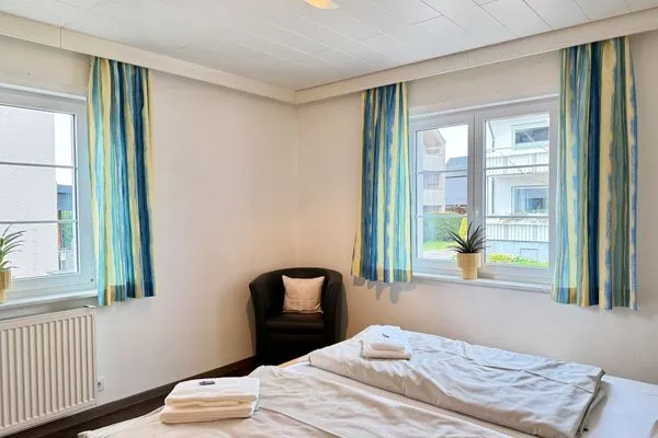 Ferienhaus Dani Ferienwohnung Rebgarten Nonnenhorn - Schlafzimmer