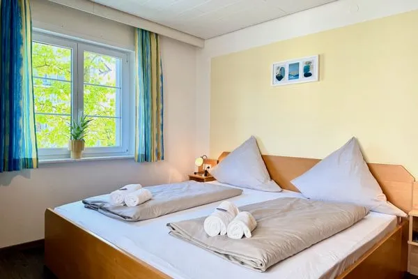 Ferienhaus Dani Ferienwohnung Rebgarten Nonnenhorn - Schlafzimmer